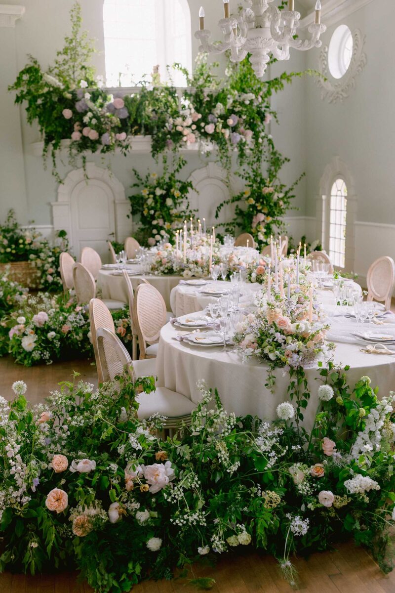 Luxury wedding tablescape at Cornwell Manor with floral installations and elegant styling.